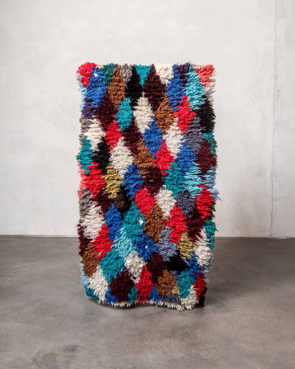 Modern designer vintage handcrafted Berber rug from Morocco. Boucherouite runner rug with beautiful colors and patterns.
